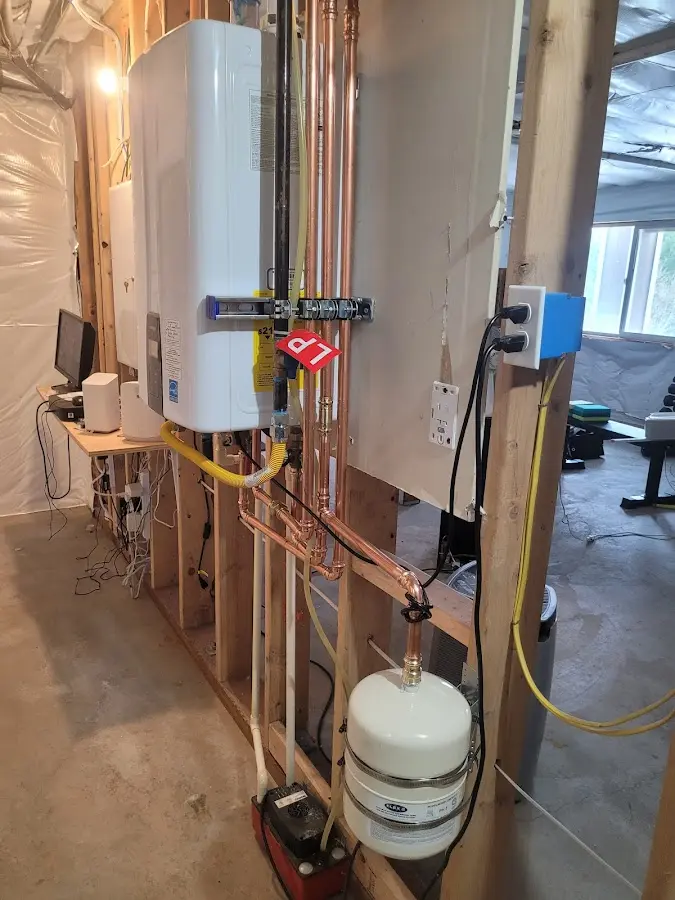 Licensed plumber repairing a kitchen sink in Taft